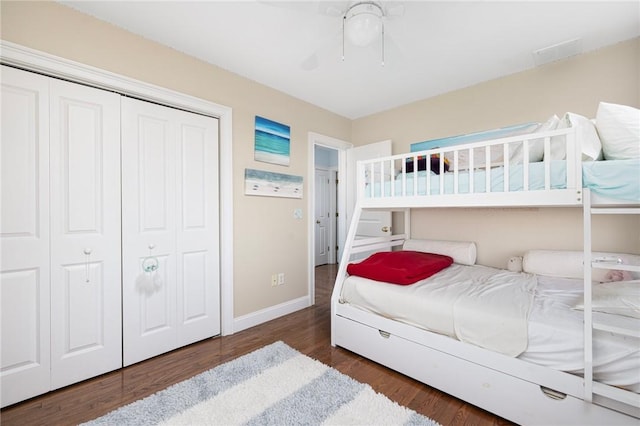 57 Foster St, Warwick, RI 02889 - bedroom with baseboards, a closet, ceiling fan, and wood finished floors