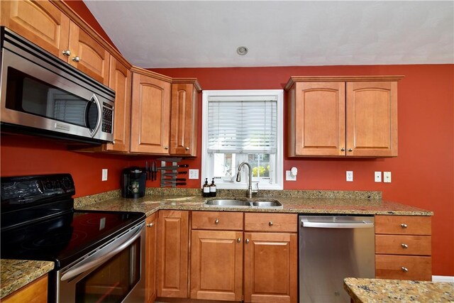 1 Augusta St, Providence, RI 02908 - kitchen featuring a sink, appliances with stainless steel finishes, and light stone countertops