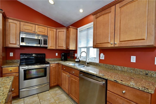 1 Augusta St, Providence, RI 02908 - kitchen with appliances with stainless steel finishes, light stone counters, a sink, recessed lighting, and vaulted ceiling