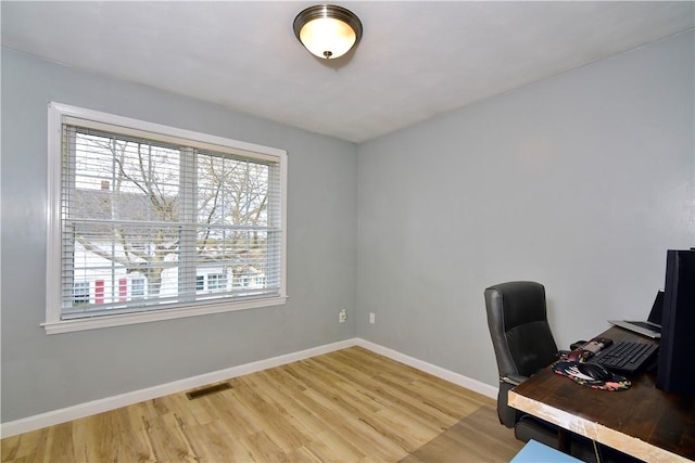 1 Augusta St, Providence, RI 02908 - unfurnished office with baseboards, visible vents, a wealth of natural light, and light wood finished floors