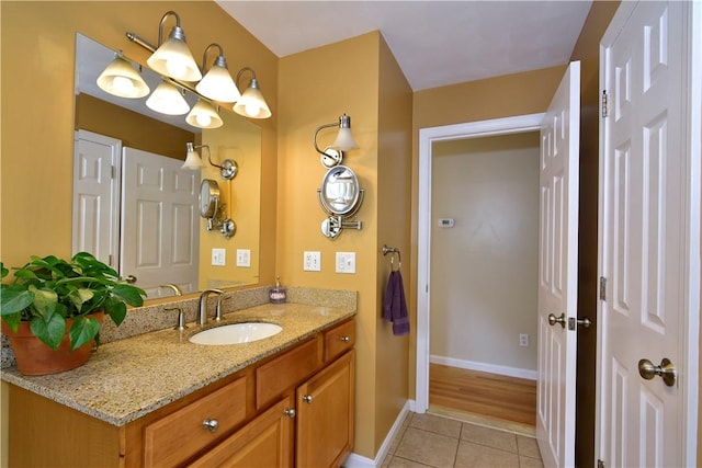 1 Augusta St, Providence, RI 02908 - bathroom with tile patterned flooring, baseboards, and vanity