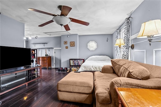 living room featuring ceiling fan and wood finished floors