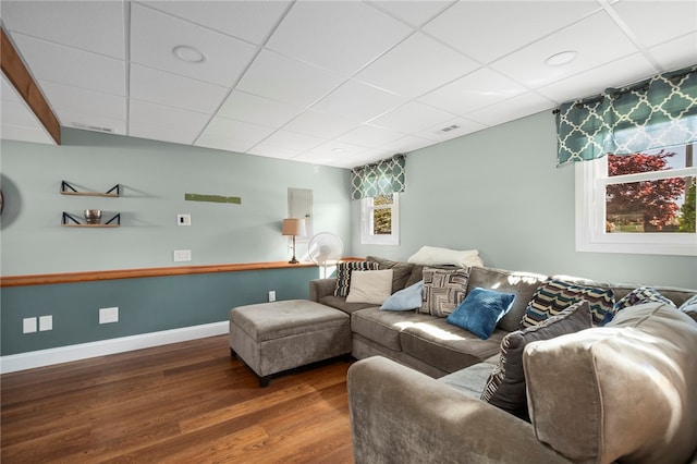 136 Wilde Field Dr, Warwick, RI 02889 - living room featuring baseboards, a drop ceiling, wood finished floors, and a wealth of natural light