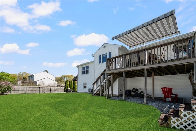 136 Wilde Field Dr, Warwick, RI 02889 - back of house with a lawn, a deck, fence, and stairs