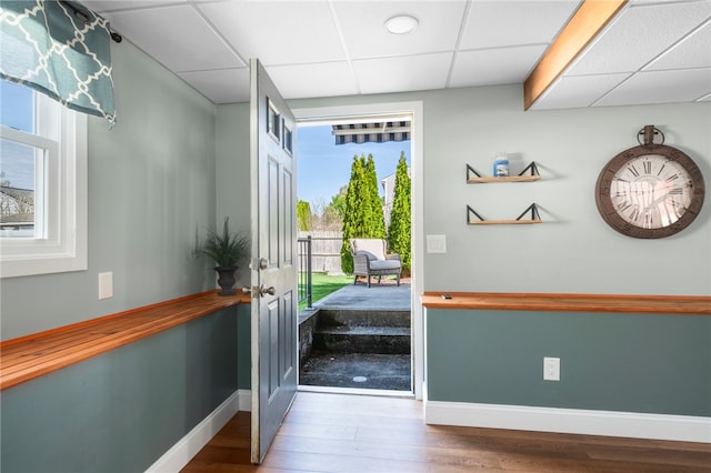 136 Wilde Field Dr, Warwick, RI 02889 - entryway with baseboards, wood finished floors, a paneled ceiling, and a wealth of natural light