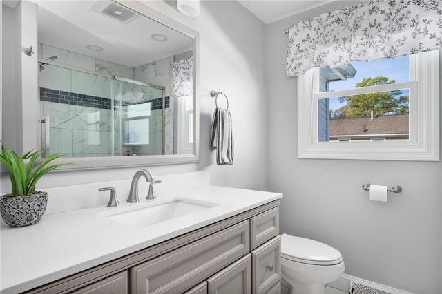 136 Wilde Field Dr, Warwick, RI 02889 - full bathroom featuring toilet, visible vents, a marble finish shower, and vanity