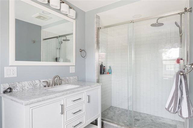 136 Wilde Field Dr, Warwick, RI 02889 - bathroom with vanity, visible vents, and a shower stall