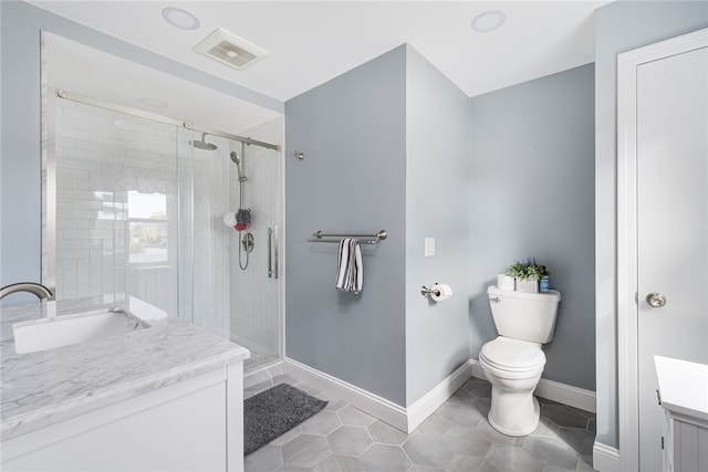 136 Wilde Field Dr, Warwick, RI 02889 - bathroom with vanity, a shower stall, tile patterned floors, and visible vents
