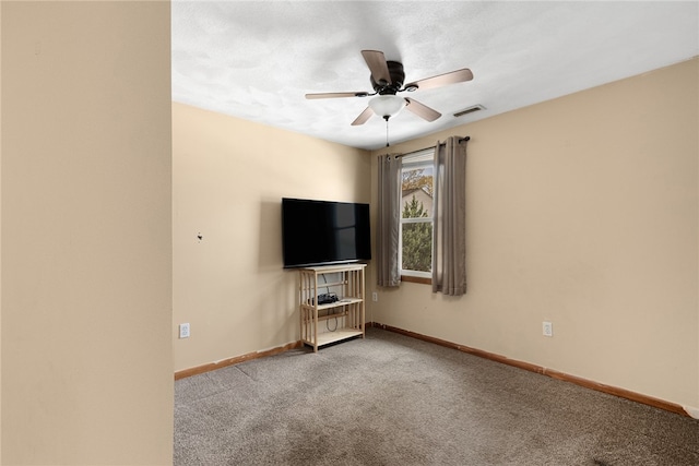 136 Wilde Field Dr, Warwick, RI 02889 - unfurnished living room with baseboards, carpet, ceiling fan, and visible vents