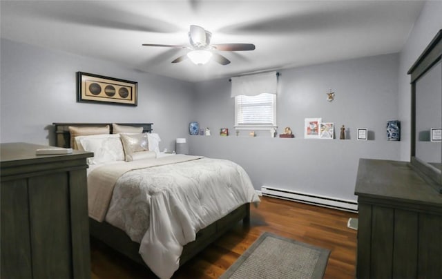 200 Manville Hill Rd Unit 126, Cumberland, RI 02864 - bedroom with a ceiling fan, baseboard heating, and wood finished floors