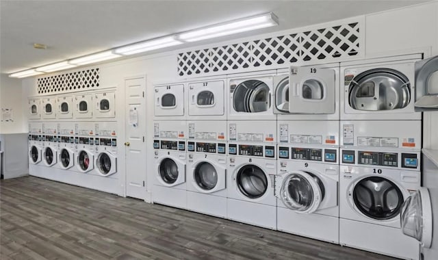 200 Manville Hill Rd Unit 126, Cumberland, RI 02864 - shared laundry area with washer and dryer, wood finished floors, and stacked washer and clothes dryer