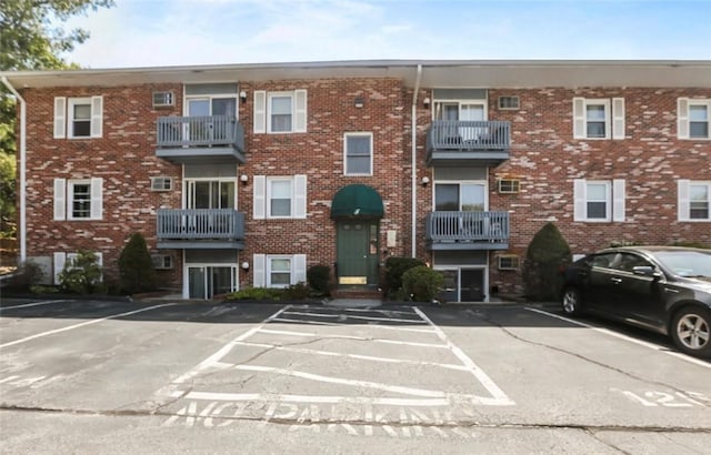 200 Manville Hill Rd Unit 126, Cumberland, RI 02864 - view of building exterior featuring uncovered parking