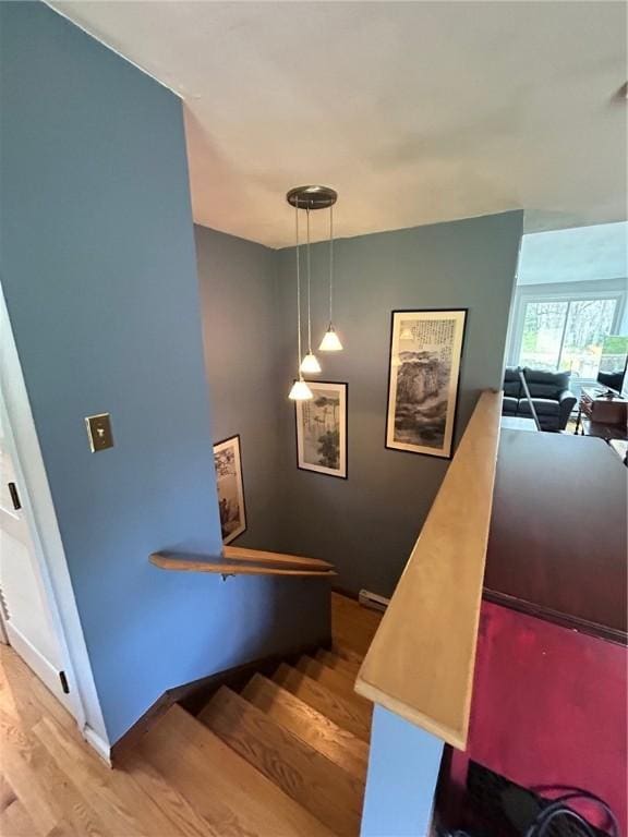 63 Duck Cove Rd, North Kingstown, RI 02852 - stairs with baseboards and wood finished floors