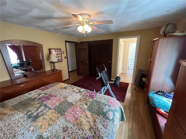 63 Duck Cove Rd, North Kingstown, RI 02852 - bedroom featuring arched walkways, ceiling fan, and wood finished floors