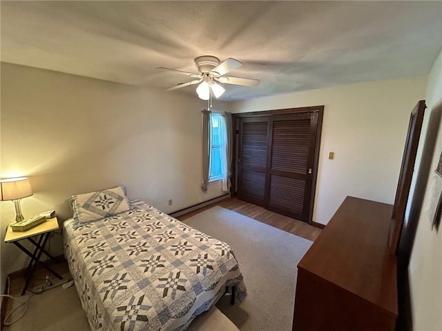 63 Duck Cove Rd, North Kingstown, RI 02852 - bedroom with wood finished floors, ceiling fan, baseboards, and a closet