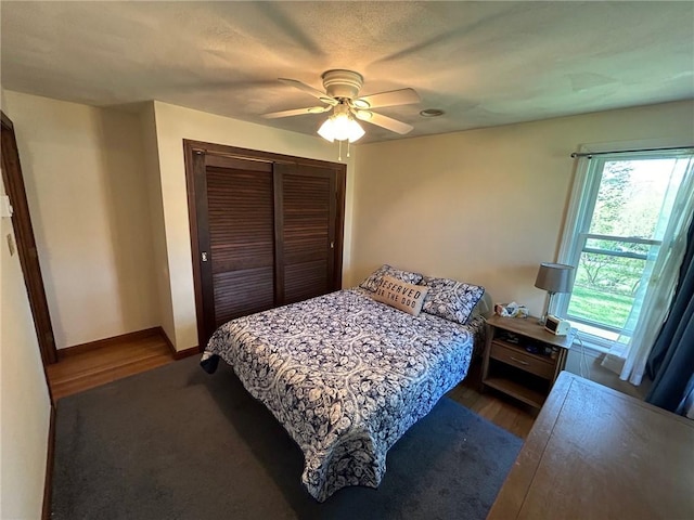 63 Duck Cove Rd, North Kingstown, RI 02852 - bedroom featuring a closet, ceiling fan, and dark wood-style floors