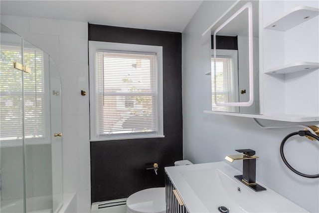46 Freeman St, Warwick, RI 02886 - full bathroom featuring vanity, a baseboard heating unit, toilet, and a wealth of natural light