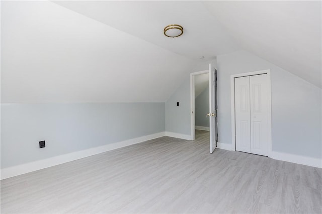 46 Freeman St, Warwick, RI 02886 - bonus room with baseboards, lofted ceiling, and light wood-style floors