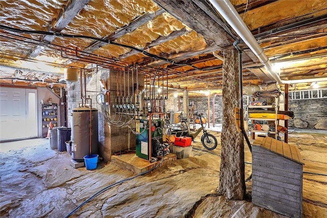 unfinished basement featuring a heating unit and gas water heater