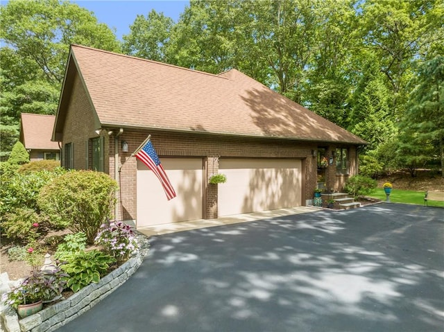 10 Oak Hill Dr, Lincoln, RI 02865 - garage featuring driveway