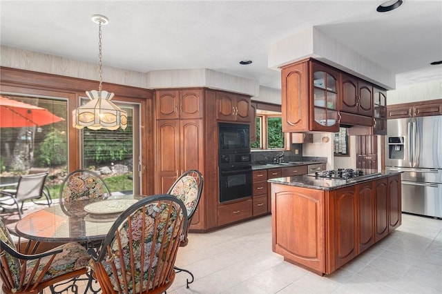 10 Oak Hill Dr, Lincoln, RI 02865 - kitchen featuring glass insert cabinets, a sink, dark countertops, a chandelier, and black appliances