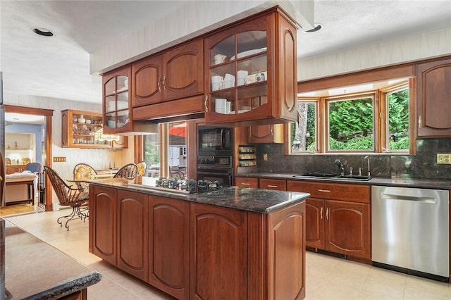 10 Oak Hill Dr, Lincoln, RI 02865 - kitchen with a sink, decorative backsplash, glass insert cabinets, black appliances, and a kitchen island