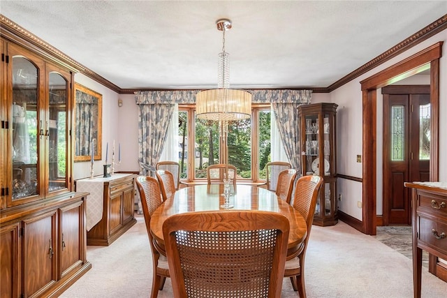 10 Oak Hill Dr, Lincoln, RI 02865 - dining room with light colored carpet, crown molding, a notable chandelier, and baseboards