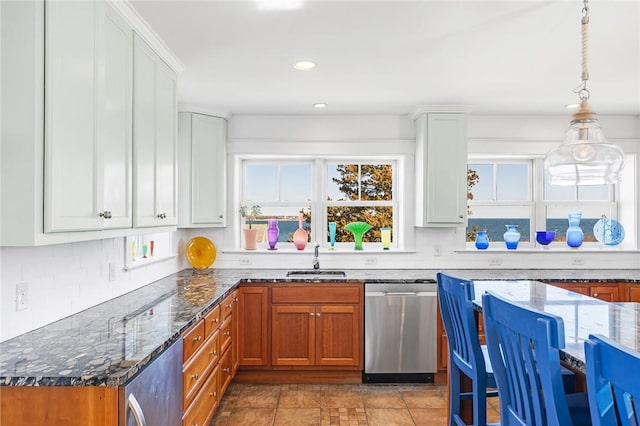 kitchen with dark stone countertops, a sink, dishwasher, recessed lighting, and backsplash