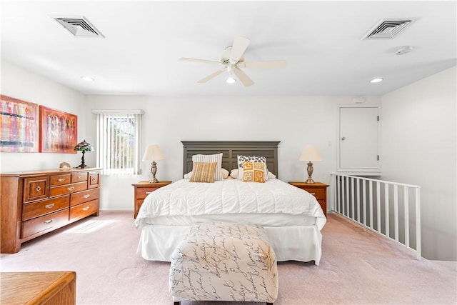 bedroom with visible vents, a ceiling fan, light colored carpet, and recessed lighting