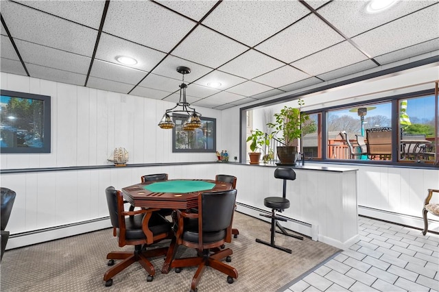 recreation room with recessed lighting and baseboard heating