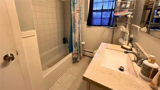 full bathroom with tile patterned flooring, a baseboard heating unit, toilet, vanity, and shower / tub combo