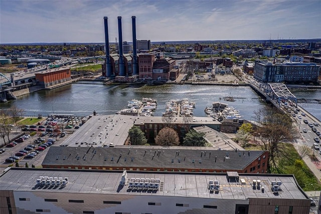 bird's eye view featuring a water view and a city view