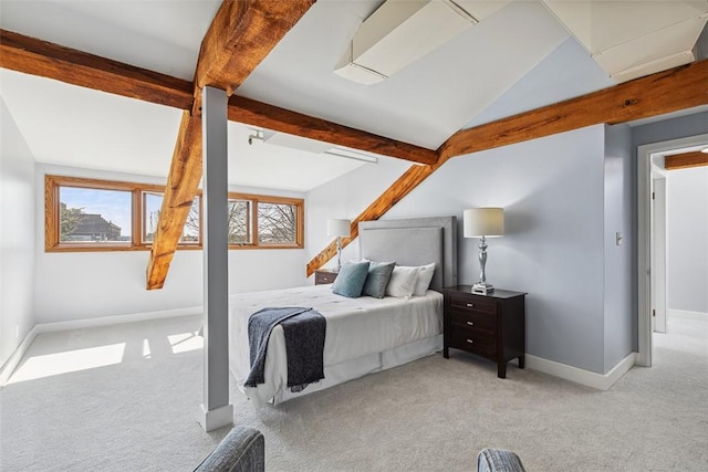 bedroom featuring lofted ceiling with beams, carpet flooring, multiple windows, and baseboards