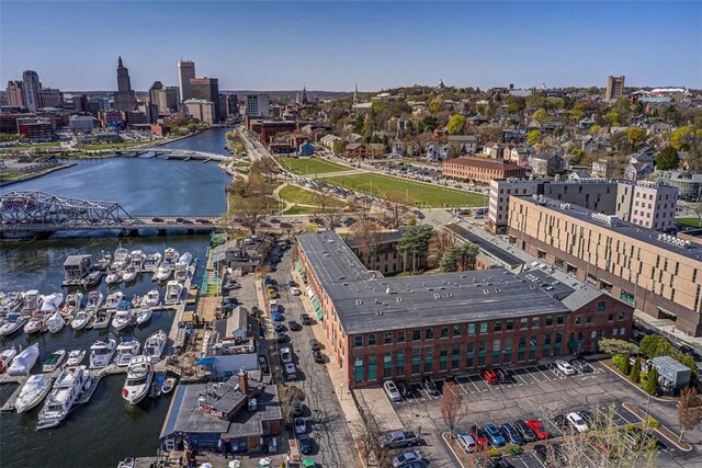 drone / aerial view with a water view and a city view