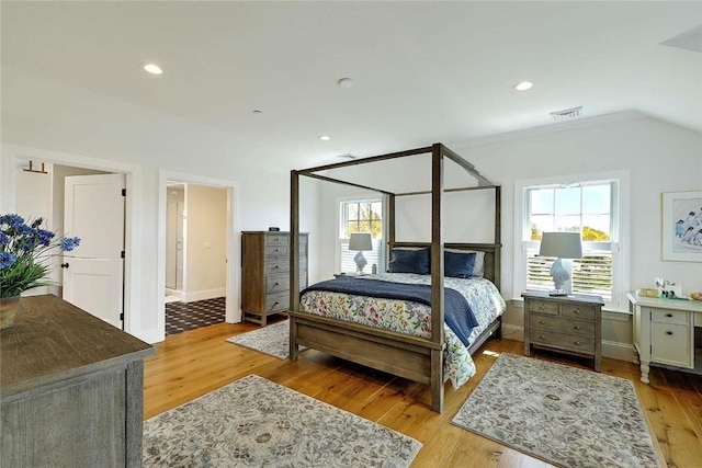 bedroom with recessed lighting, baseboards, visible vents, and light wood-type flooring