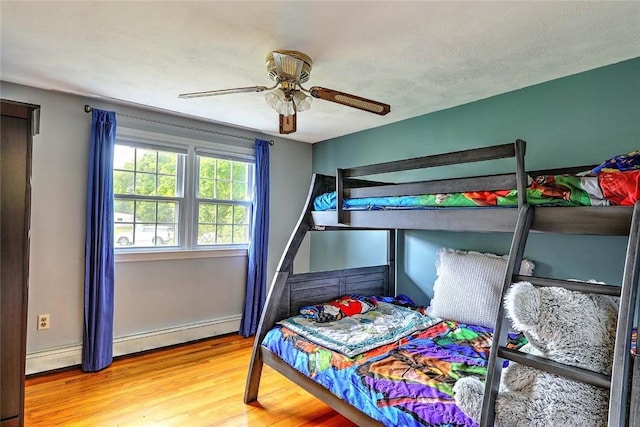 4 Johnson Ct, Bristol, RI 02809 - bedroom with wood finished floors, ceiling fan, and baseboards