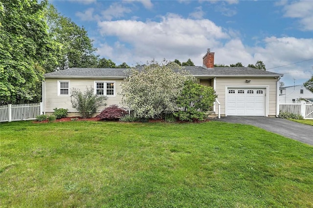 4 Johnson Ct, Bristol, RI 02809 - view of front of home with driveway, a garage, and a chimney