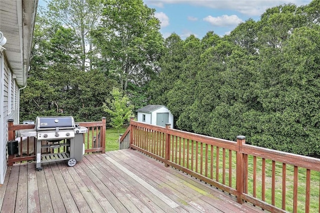 4 Johnson Ct, Bristol, RI 02809 - wooden deck featuring a lawn, a grill, and view of wooded area