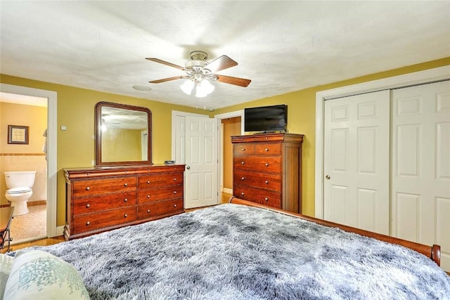4 Johnson Ct, Bristol, RI 02809 - bedroom with ceiling fan, ensuite bathroom, and baseboards