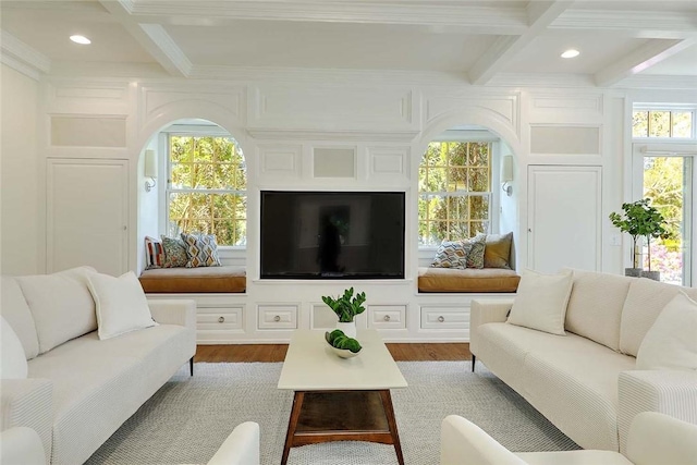 750 Elmgrove Ave, Providence, RI 02906 - living room with crown molding, arched walkways, coffered ceiling, and beam ceiling