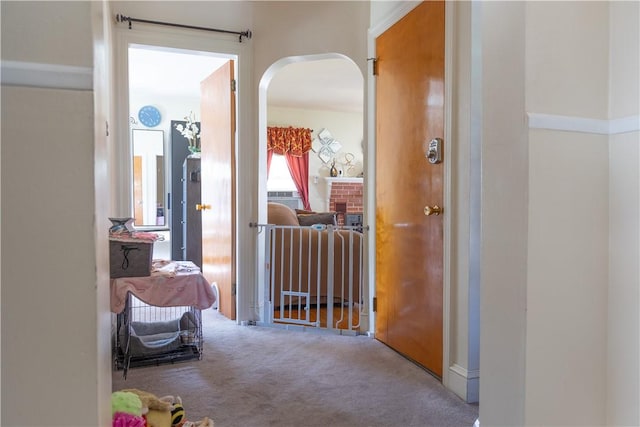 132 Bakers Creek Rd, Warwick, RI 02886 - hall with arched walkways and carpet flooring