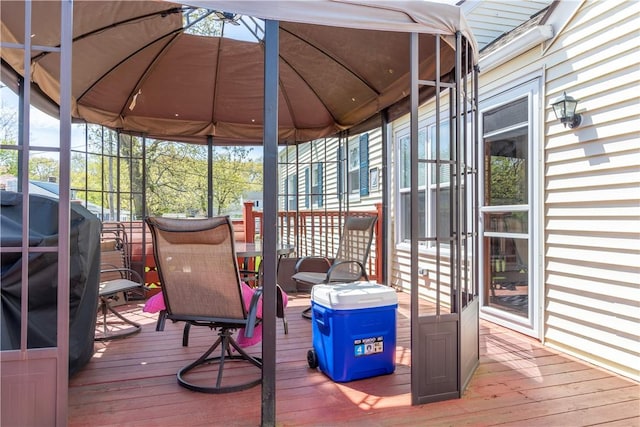 132 Bakers Creek Rd, Warwick, RI 02886 - wooden deck with a gazebo and area for grilling