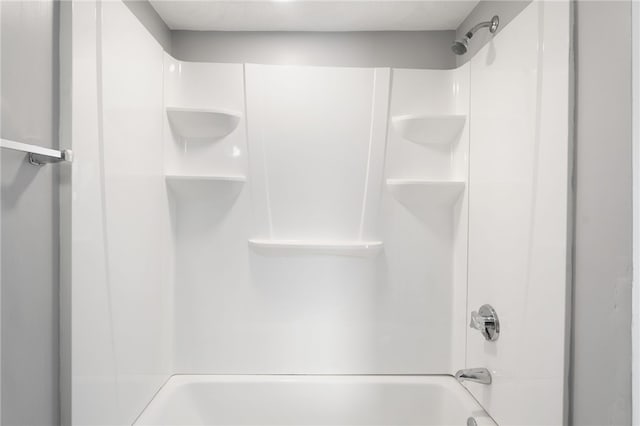 bathroom with shower / bathing tub combination