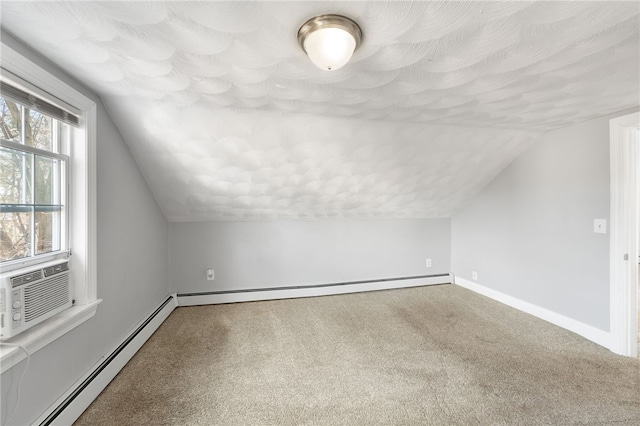 bonus room with cooling unit, carpet flooring, baseboard heating, and vaulted ceiling