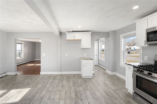 kitchen with a baseboard heating unit, stainless steel appliances, light wood-style flooring, baseboards, and a baseboard radiator