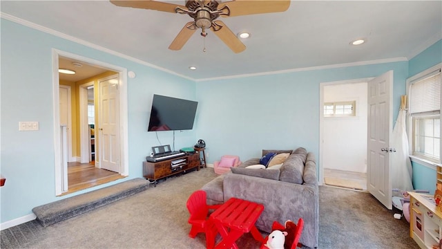 carpeted living room featuring crown molding, ceiling fan, and recessed lighting