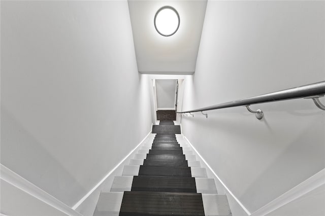 stairway with baseboards