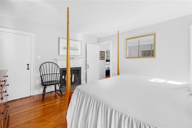 42 Second St, Newport, RI 02840 - bedroom featuring a fireplace and wood finished floors