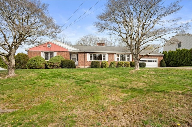 21 Top St, Westerly, RI 02891 - ranch-style house with brick siding, a front yard, and a garage