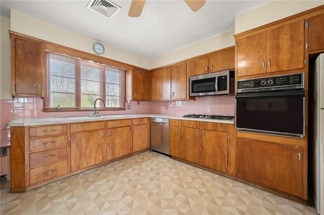 21 Top St, Westerly, RI 02891 - kitchen with visible vents, light floors, light countertops, a sink, and appliances with stainless steel finishes